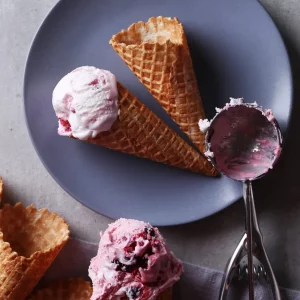 Delicious ice cream cone on a dish