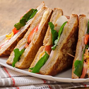 Club sandwich with chicken and ham